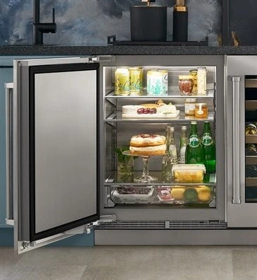 An open Sub-Zero DEU2450RO R outdoor refrigerator stocked